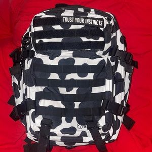 35L BACKPACK BLACK WHITE COW W/CUP HOLDERS.